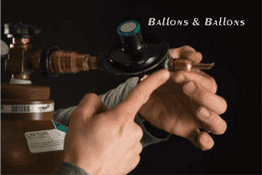 Eine Person füllt eine Propanflasche mit einer Gaskanister in Wien.