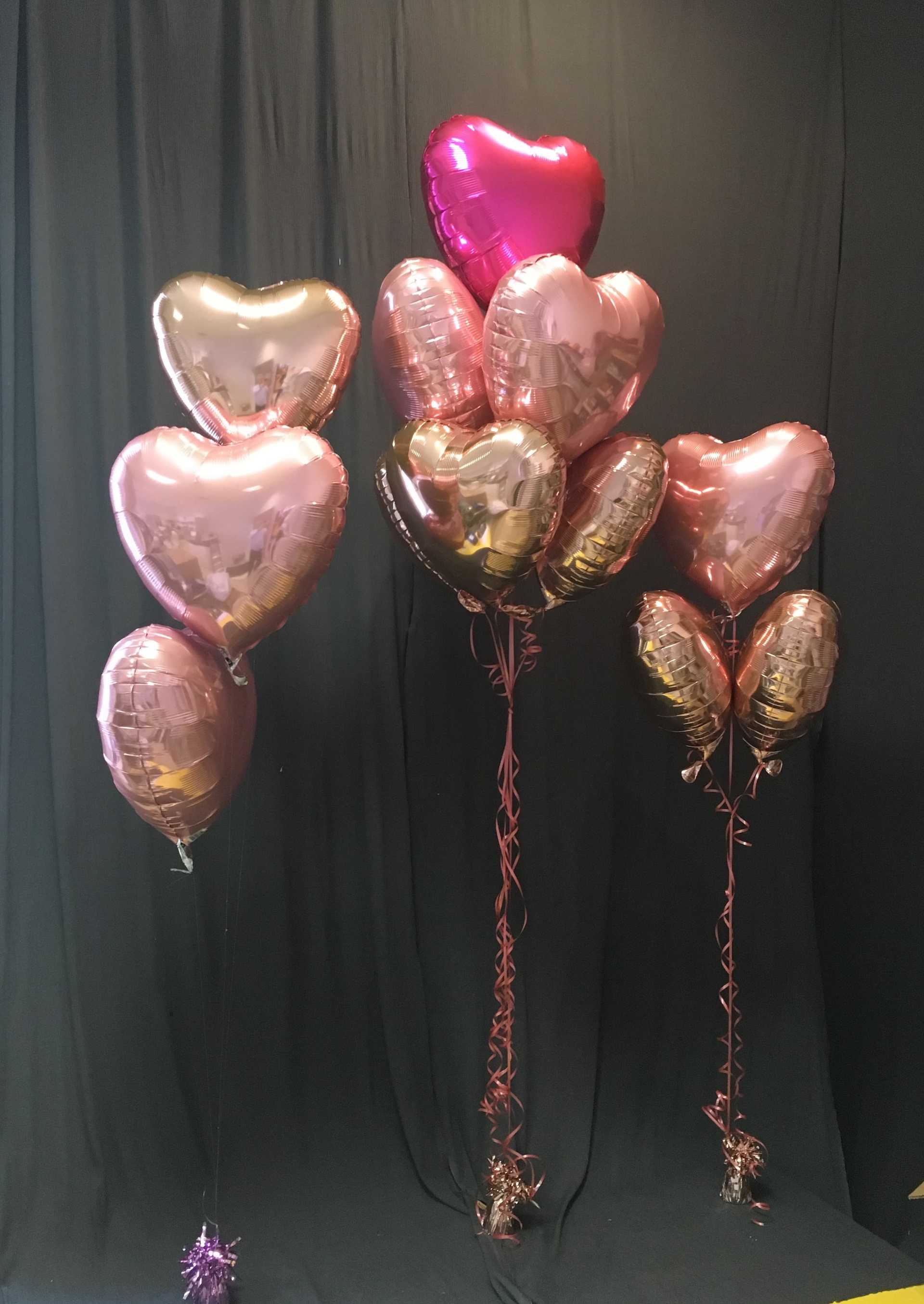 Drei nebeneinander angeordnete herzförmige Ballons in Wien